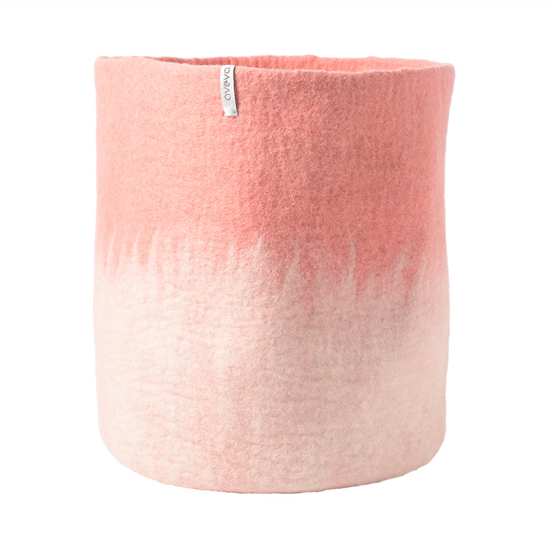 Aveva Flower Pot 18, Aveva’s handmade flowerpots in 100% wool with a flat bottom and two different colors blend together, creating a lovely ombré effect. The inside is coated with natural rubber that makes the flowerpot waterproof. Follow the care instructions below