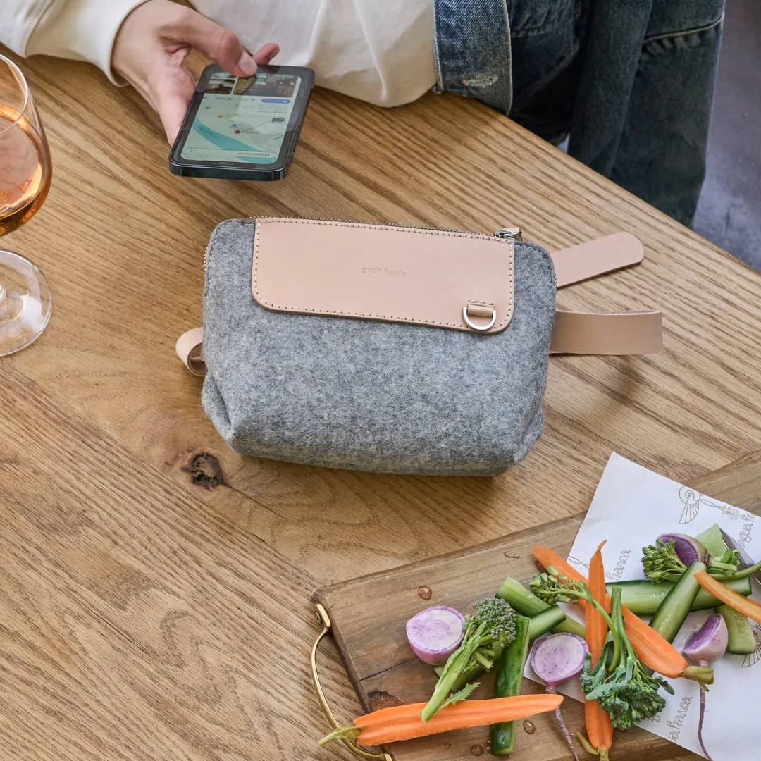 Made of high quality Merino wool, this lightweight and compact bag is ultra-versatile to accommodate all your essentials. The founders of Graf Lantz chose to work with some of the world's earliest, most durable and sustainable materials, wool felt, leather, hemp, canvas and glass. Using the finest Merino wool, Graf Lantz brought fun and style to the once overlooked miracle fabric to bring the Japanese ideas of less but feeling good.