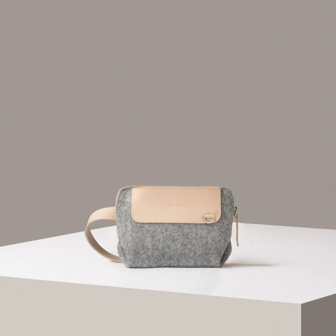 Made of high quality Merino wool, this lightweight and compact bag is ultra-versatile to accommodate all your essentials. The founders of Graf Lantz chose to work with some of the world's earliest, most durable and sustainable materials, wool felt, leather, hemp, canvas and glass. Using the finest Merino wool, Graf Lantz brought fun and style to the once overlooked miracle fabric to bring the Japanese ideas of less but feeling good.