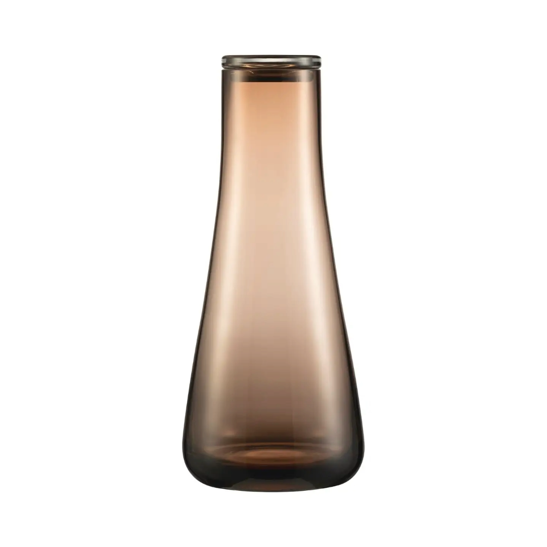 This Glass Carafe has a glass lid that makes your drinking very classy and the simplistic form is attractive in any setting. This can be put by your bedside and work wonderfully in a shared space or a masculine aesthetic.