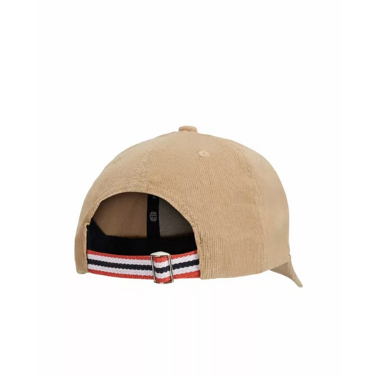A beige corduroy baseball cap with an adjustable strap in the back and a Amundsen brand tag on the front. Norwegian striped colorful details.