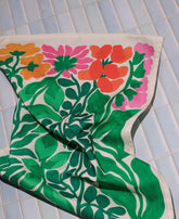 Printed on organic cotton and made in the UK, it is designed for everyday use while still feeling like a small piece of art. The rich colours bring warmth and depth to the kitchen.