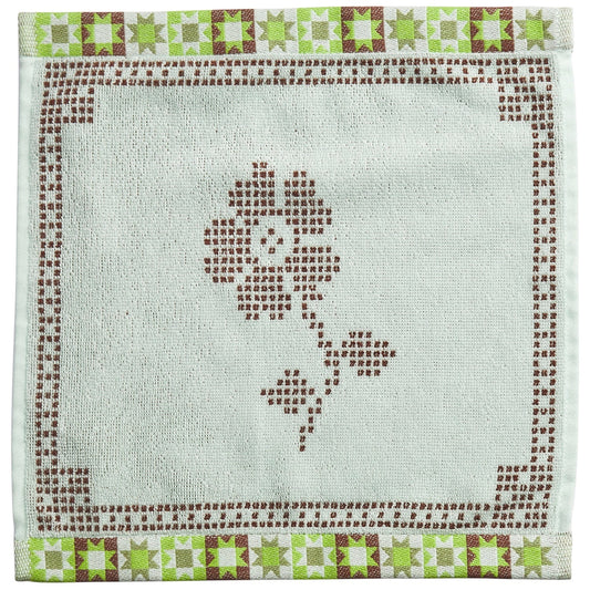 light green and brown square towel with brown patterned flower in center