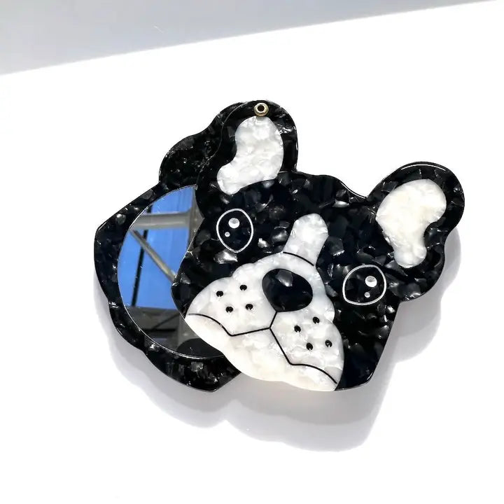 The mirrors are hand painted by artists. Carefully crafted from cellulose acetate - an eco-friendly, biodegradable material made from recycled wood pulp. These signature original designs you can't find anywhere else!
