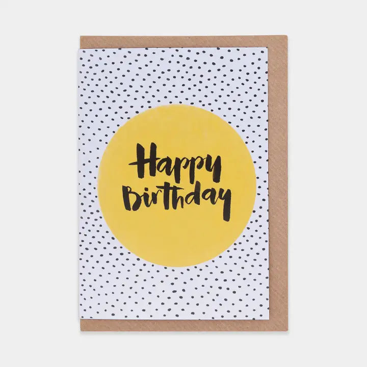 Birthday card with yellow circle and 'Happy Birthday' text on a polka dot background