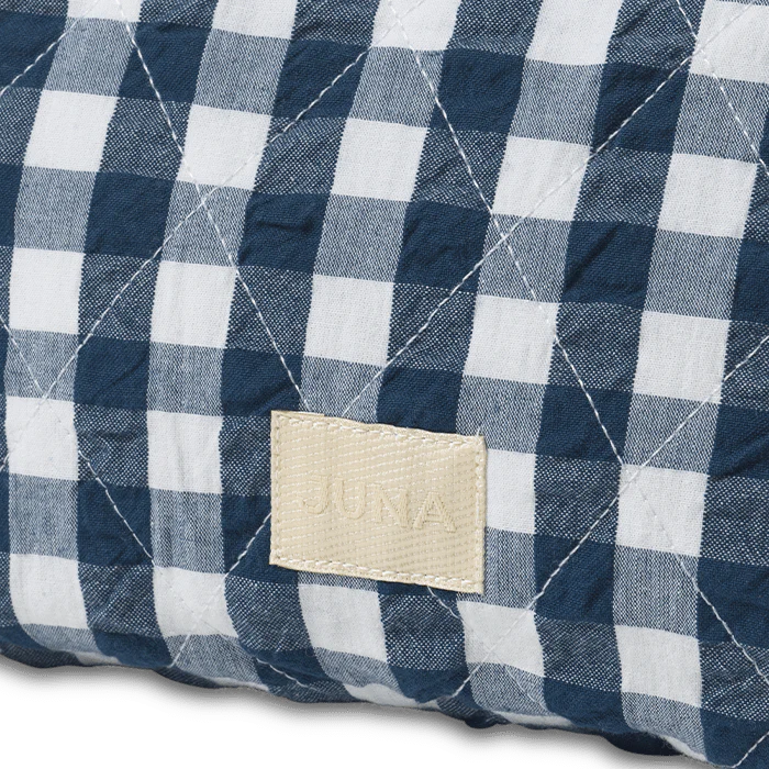 Measuring 9" x 6" x 2", the Nola toiletry bag is a timelessly cool quilted bag perfect for keeping your belongings in one place: makeup, stationery, electronics, or whatever you decide. The Nola bag is as practical as it is sustainable, and as stylish as it is versatile.
