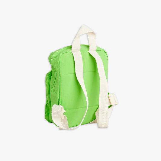Green backpack with white straps on a white background