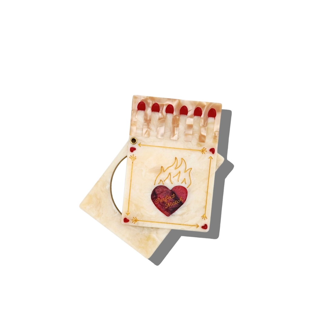 This compact mirror is designed to be slim and represent a cute matchbox with the words Perfect Match on it. What a cute gift to get for your Girlfriend or wife. This also would be adorable in a bridesmaid basket or gift. So many options to include in a themed valentines box or just for fun.