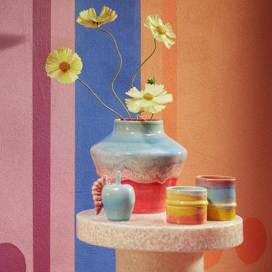 An absolute must-have for a playful yet practical home, this lovely mug is the perfect embodiment of KIMPOP's creative identity and Kähler's ceramic heritage. Perfect for hot or cold beverages, this mug makes the ideal gift for many occasions. Poppery is an excitingly vibrant collection by Kähler and KIMPOP, a Danish design duo comprising Sofie Linde and Joakim Ingversen, two exceptionally exuberant and creative characters in Danish pop culture. The collection is a shift from Scandinavian design norms throu