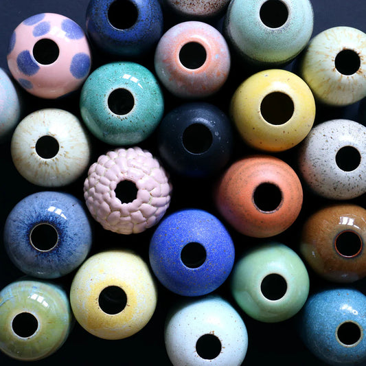 Handmade and unique glazes on mini yuki vase.