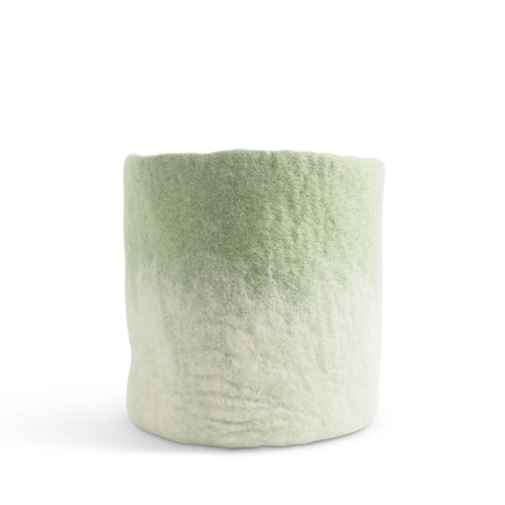 Aveva Flower Pot 18, Aveva’s handmade flowerpots in 100% wool with a flat bottom and two different colors blend together, creating a lovely ombré effect. The inside is coated with natural rubber that makes the flowerpot waterproof. Follow the care instructions below