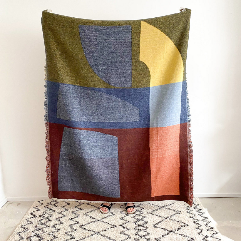 Indulge in the luxurious warmth and style of the Sophie Home Merino Blend Throw Blanket. Made from a premium merino wool blend, this throw blanket not only looks great draped over your furniture, but it also provides unbeatable comfort and coziness on chilly days. Add a touch of sophistication to your home decor with this high-end throw blanket.