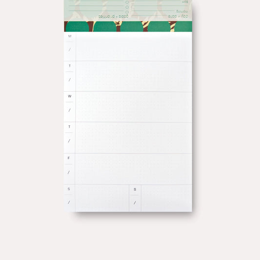 The Marfa Daily Planner Pad is a desk-essential for modern, design-savvy minds.
Featuring the Marfa print - chocolate base with butter-yellow abstract leaf print covered in green polka dots - it brings the SS2026 collection’s warm, layered, slightly hazy energy to your everyday planning.