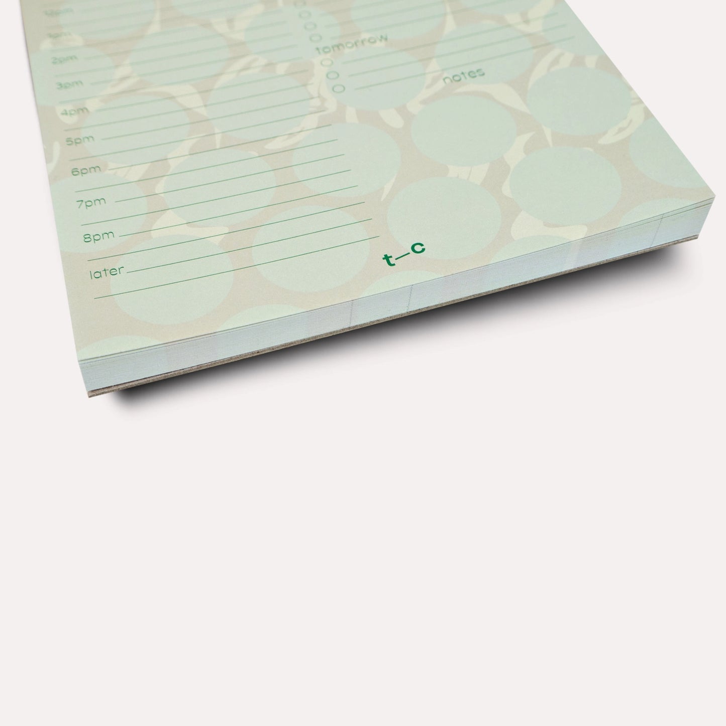 The Marfa Daily Planner Pad is a desk-essential for modern, design-savvy minds.
Featuring the Marfa print - chocolate base with butter-yellow abstract leaf print covered in green polka dots - it brings the SS2026 collection’s warm, layered, slightly hazy energy to your everyday planning.