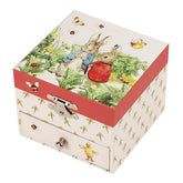Jewelry box with illustrations of rabbits and nature on a white background