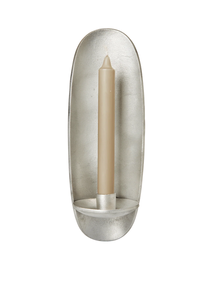 Named after the Greek word for ‘spiritual love and charity,’ the Agapé Wall Candle Holder is crafted from recycled cast aluminium. Its rustic surface creates a mesmerising ambience, infusing your surroundings with a sense of warmth and spirituality while adding a touch of elegance. Designed to fit a 2.2 cm taper candle, the Agapé Wall Candle Holder is wall-mounted, seamlessly combining functionality with timeless beauty.