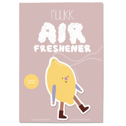 A rectangular perfume card or air freshener packaging card on a white background. The card has a dusty pink background with the text 'nuukk AIR FRESHENER' in white, a yellow circle reading 'CHERRY LEMON', and a cartoon lemon character with legs and arms walking across the lower half.