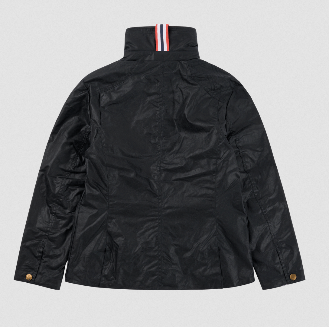 Black lightweight jacket shown from the back, featuring a high collar with a red, white, and blue striped trim and gold-tone snap buttons on the sleeves, photographed against a light gray background.