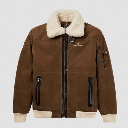 A brown suede aviator-style jacket with a cream sherpa collar, ribbed cream cuffs and hem, and black zipper details, shown flat on a light gray background. The brand name 'AMENSHEN' is embroidered on the left chest.