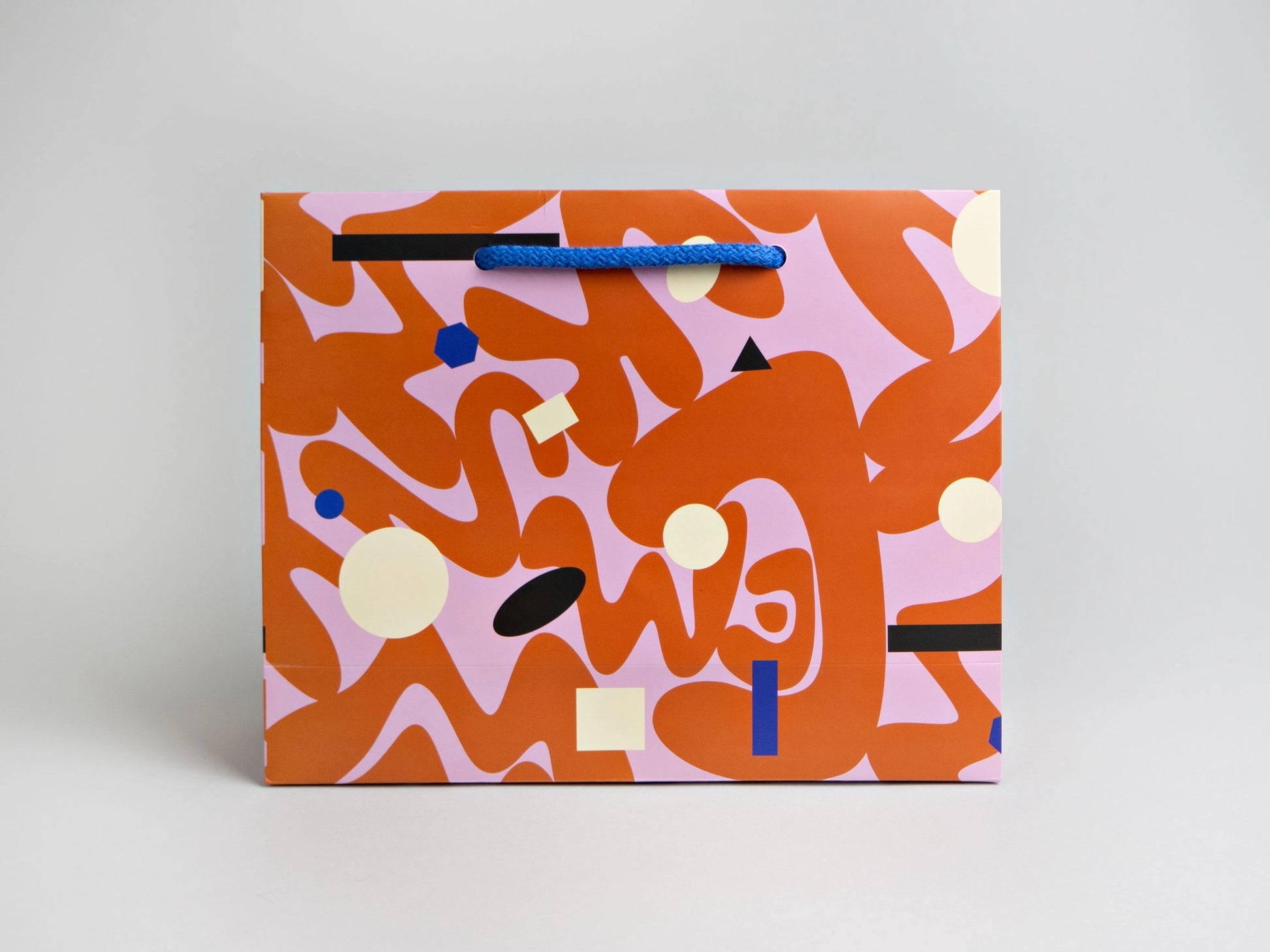 This luxury gift bag made from 200gsm card measures 25 x 20 cms, and is 8 cms deep. It's approximately A5 size. It has heavy cotton handles and can be used again if looked after.