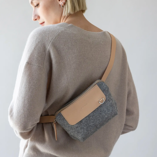 Made of high quality Merino wool, this lightweight and compact bag is ultra-versatile to accommodate all your essentials. The founders of Graf Lantz chose to work with some of the world's earliest, most durable and sustainable materials, wool felt, leather, hemp, canvas and glass. Using the finest Merino wool, Graf Lantz brought fun and style to the once overlooked miracle fabric to bring the Japanese ideas of less but feeling good. 