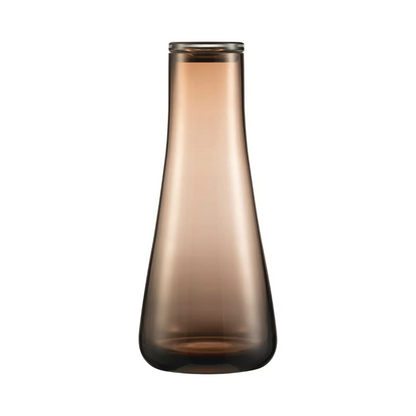 This Glass Carafe has a glass lid that makes your drinking very classy and the simplistic form is attractive in any setting. This can be put by your bedside and work wonderfully in a shared space or a masculine aesthetic. 
