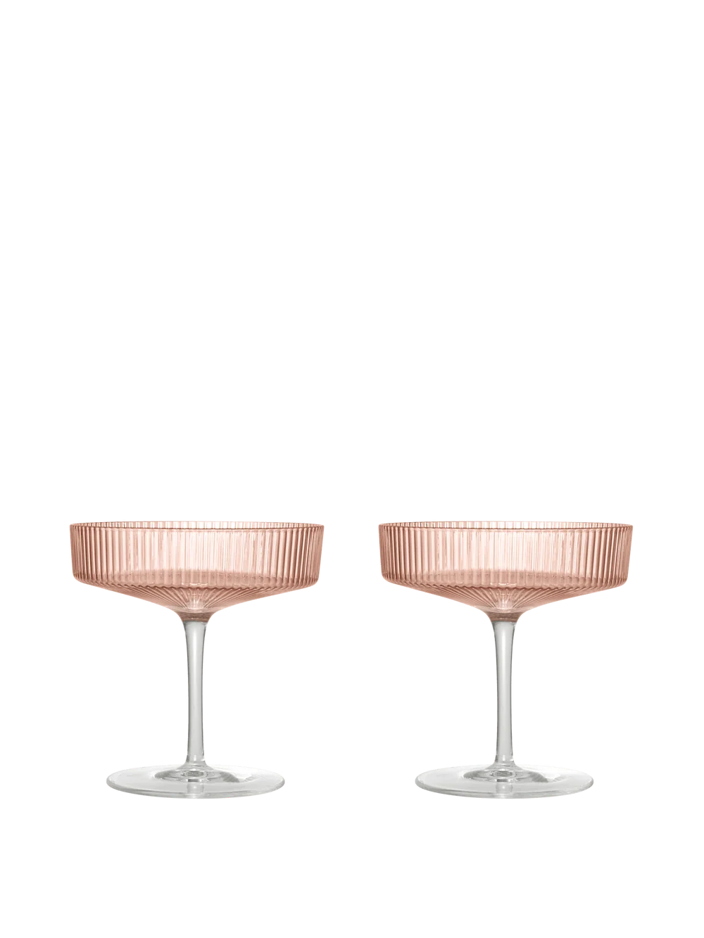 Two champagne coupe glasses with a ribbed, blush pink translucent bowl and clear glass stems, set against a solid white background.