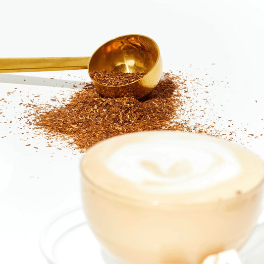 Brushed gold tea scoop, that perfectly measures out a single serving of tea.