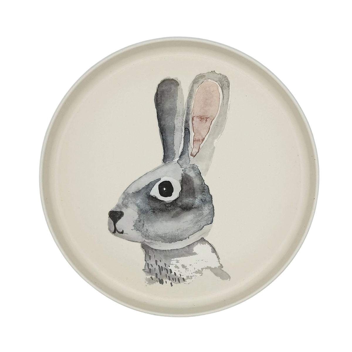 A round ceramic plate with a hand-painted watercolor rabbit illustration in gray, black, and soft pink on an off-white background.