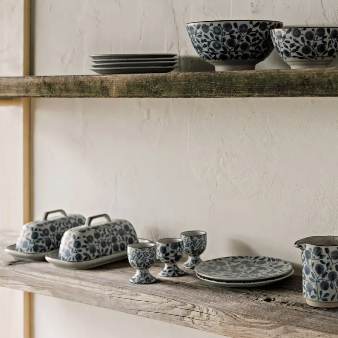 Add a touch of cozy charm to your kitchen with the Danica Butter Dish. Crafted from stoneware ceramic, it blends cottagecore warmth with a sleek, contemporary style. Perfect on its own or paired with matching plateware and utensils, this butter dish turns everyday moments into delightful rituals. Keep your butter fresh and your table stylish with a piece that’s as playful as it is practical.
