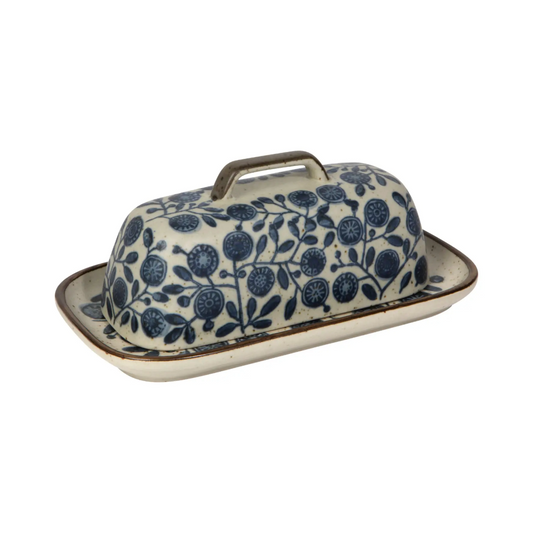 Add a touch of cozy charm to your kitchen with the Danica Butter Dish. Crafted from stoneware ceramic, it blends cottagecore warmth with a sleek, contemporary style. Perfect on its own or paired with matching plateware and utensils, this butter dish turns everyday moments into delightful rituals. Keep your butter fresh and your table stylish with a piece that’s as playful as it is practical.