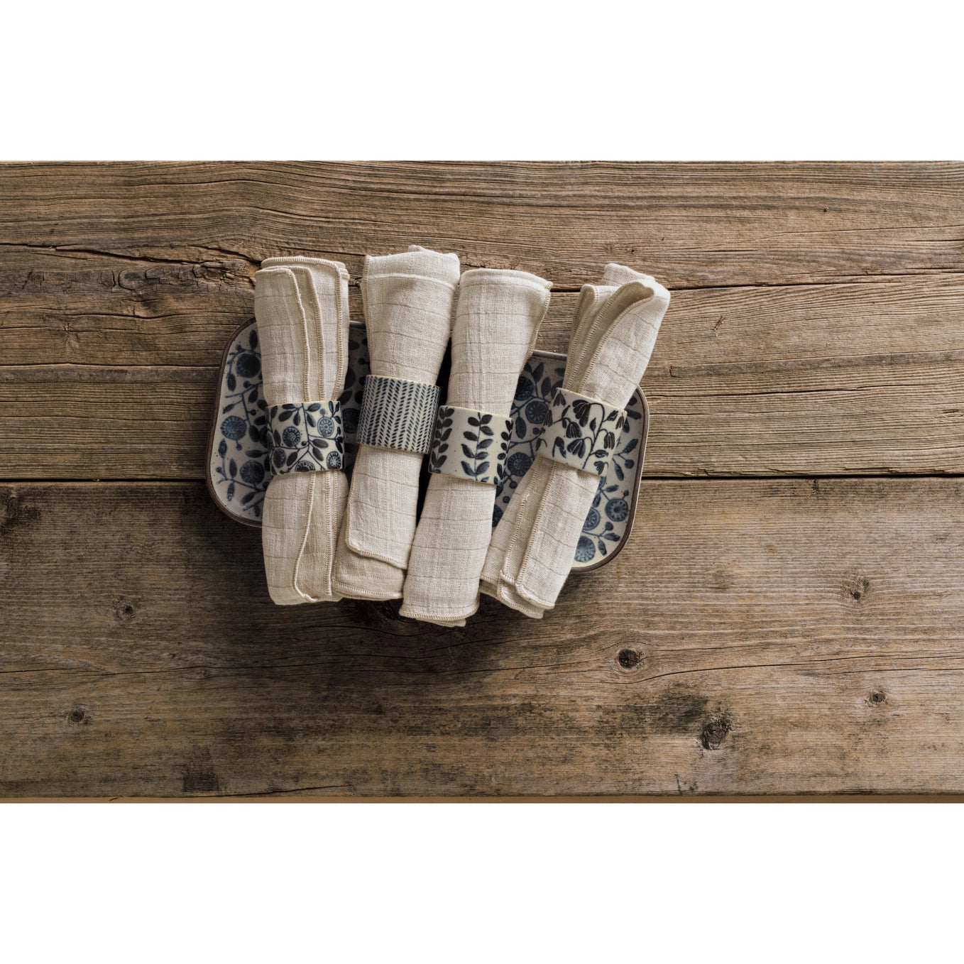 Complete the table setting with lightweight yet durable stoneware Calendula napkin rings. Capture the essence of water, air, earth, and fire with this collection that soothes, revives, grounds and ignites—awakening our natural connection to the elements.