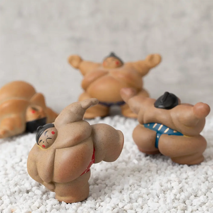Each piece is hand-painted by a skilled artisan in Japan, giving each figure a slightly different, unique expression. They are made of semi-porcelain, and the lovable form of the sumo wrestler is going to bring a lot of charm to your life. The three stances would look wonderful together on your shelf or alone, scattered around. They encapsulate a Japanese cultural icon and can be a reminder of your desire to travel there or a trip you want to memorialize.