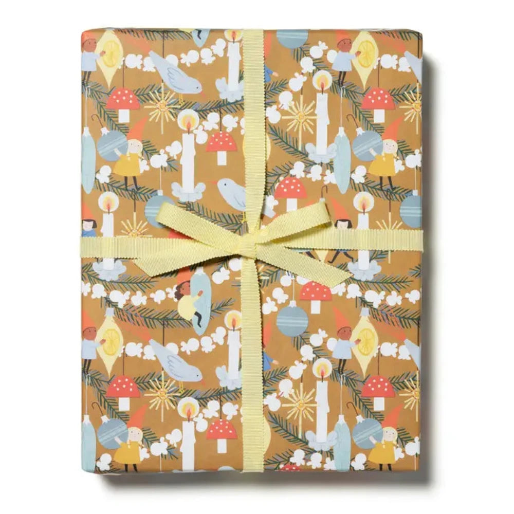 A wrapped gift with multicolored stripes and floral patterned wrapping paper, tied with a green ribbon.