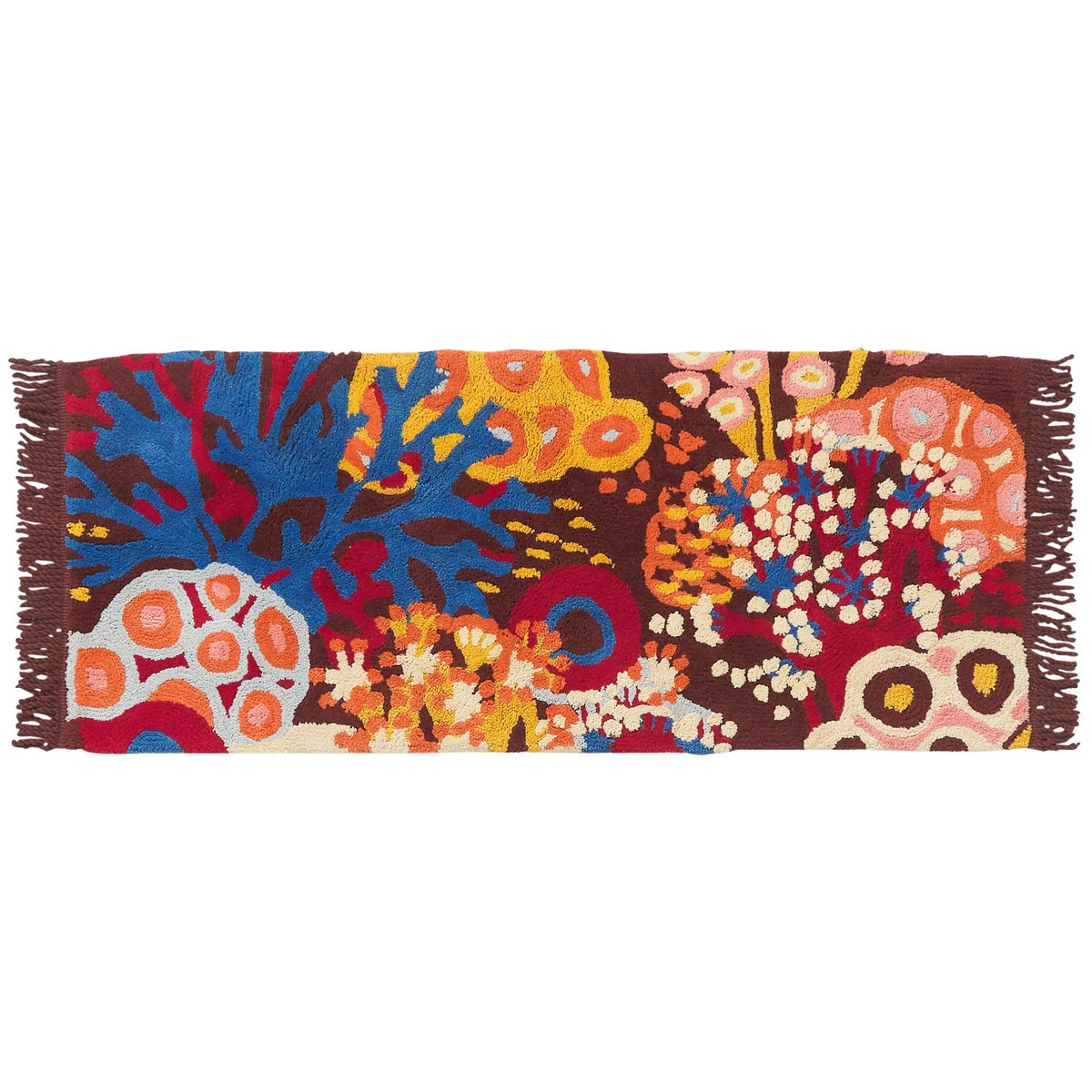 Colorful woven rug with abstract patterns on a white background