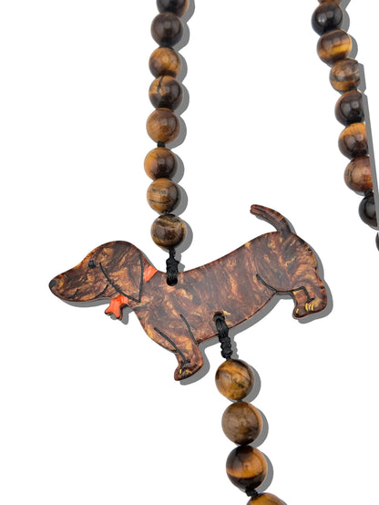 Solar Eclipse's signature Dachshund—long, minimal, and just a little bit cheeky. A streamlined silhouette with unmistakable charm.