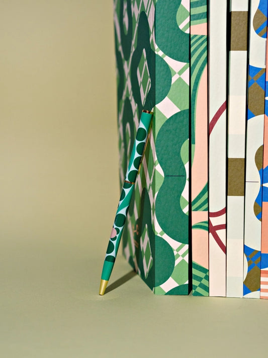 Style-conscious stationery shoppers

Fashion-inspired gifts

Customers looking for eco-friendlier writing tools

Retailers after stationery with “statement piece” energy

Specs:

Slimline metal body with olive + blue check print on cream

Gold plated (no tarnish, all luxe)

Black, fineline ballpoint ink

Refillable (refills sold separately)

wholesale pens, refillable pens wholesale, designer stationery wholesale, check print pen, stylish desk accessories, eco-friendly pen wholesale, slimline pens, fashion 