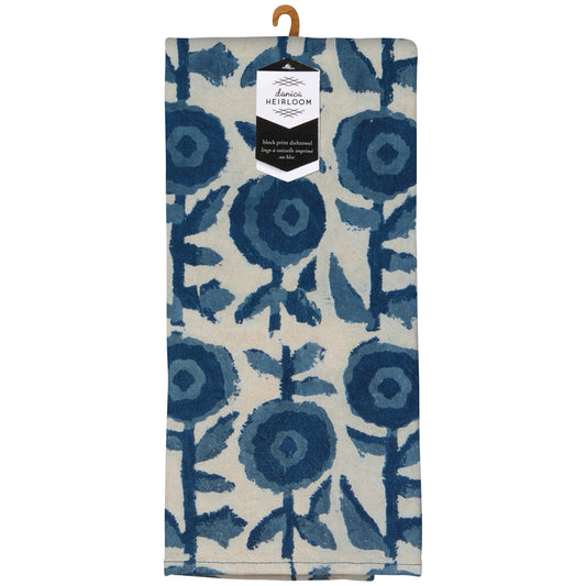 A linen kitchen towel with a blue floral block print on an off-white background, hanging from a wooden hanger with a 'Lana Heirloom' paper tag attached.