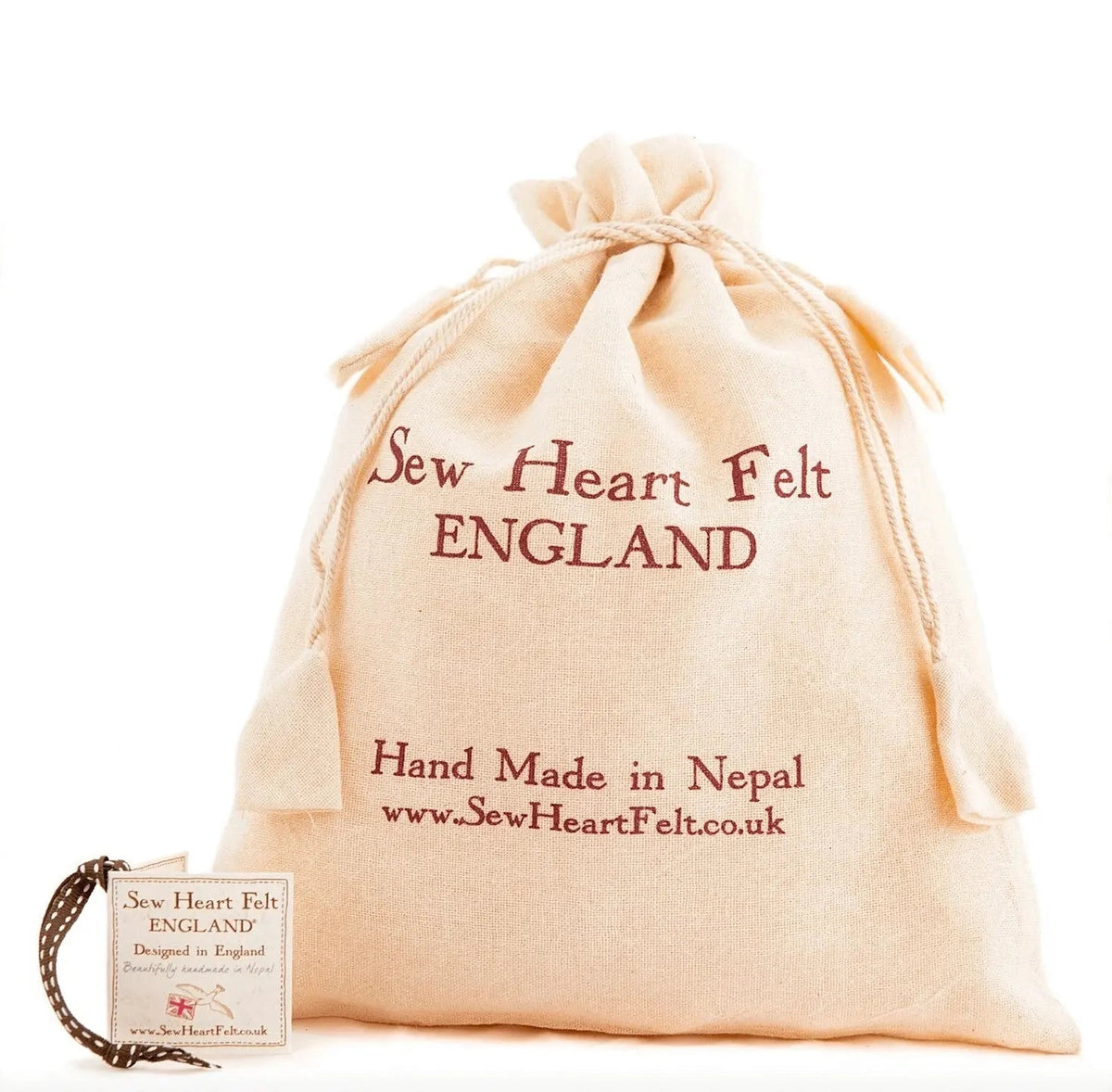 Sew heart felt drawstring bag on white background