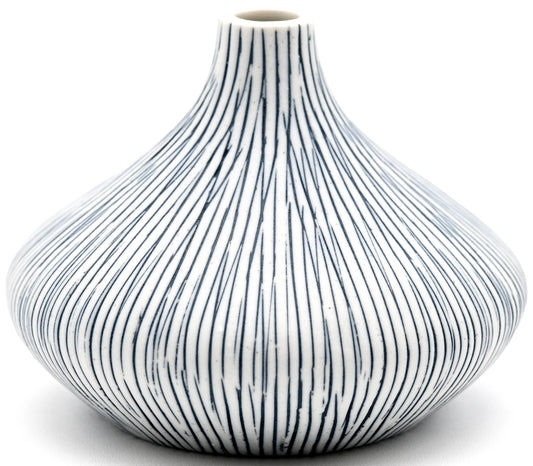 Decorative vase with black ribbed pattern on a white background