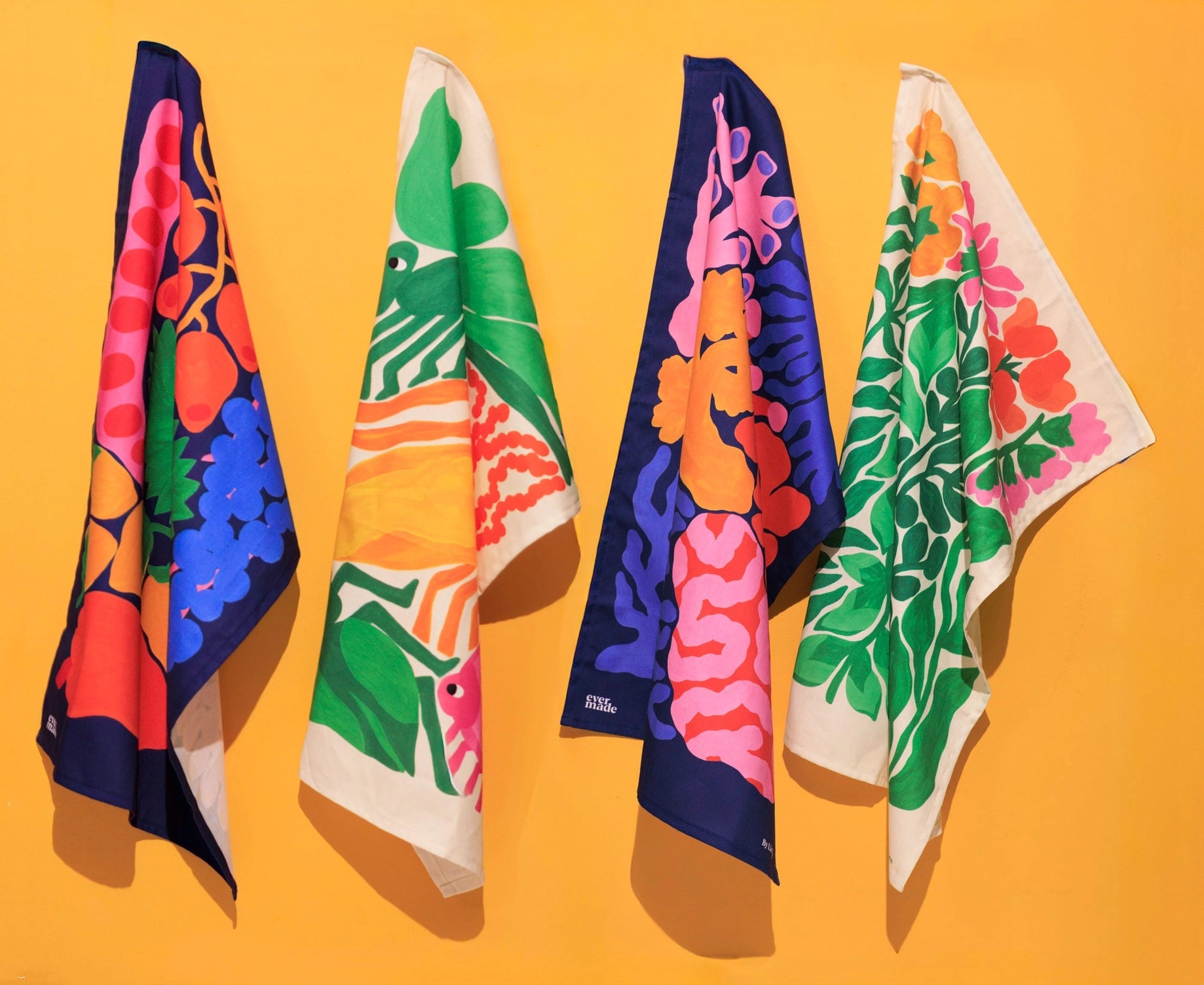 Printed on organic cotton and made in the UK, it is designed for everyday use while still feeling like a small piece of art. The rich colours bring warmth and depth to the kitchen.