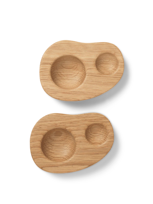 Two wooden snack plates with a natural finish on a white background