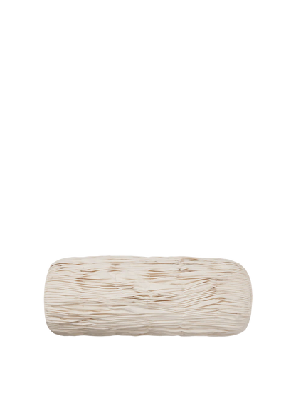 Ferm Living Falda Smocked Bolster Cushion has fabric is gathered into fine pleats and secured with decorative stitching. It will add texture to your decor. Find this at Huset Shop in Venice Beach.