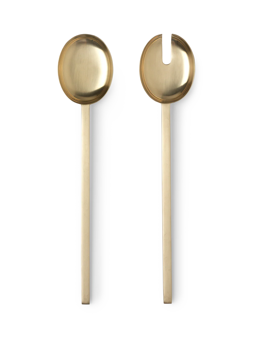 Two gold-colored spoons on a white background