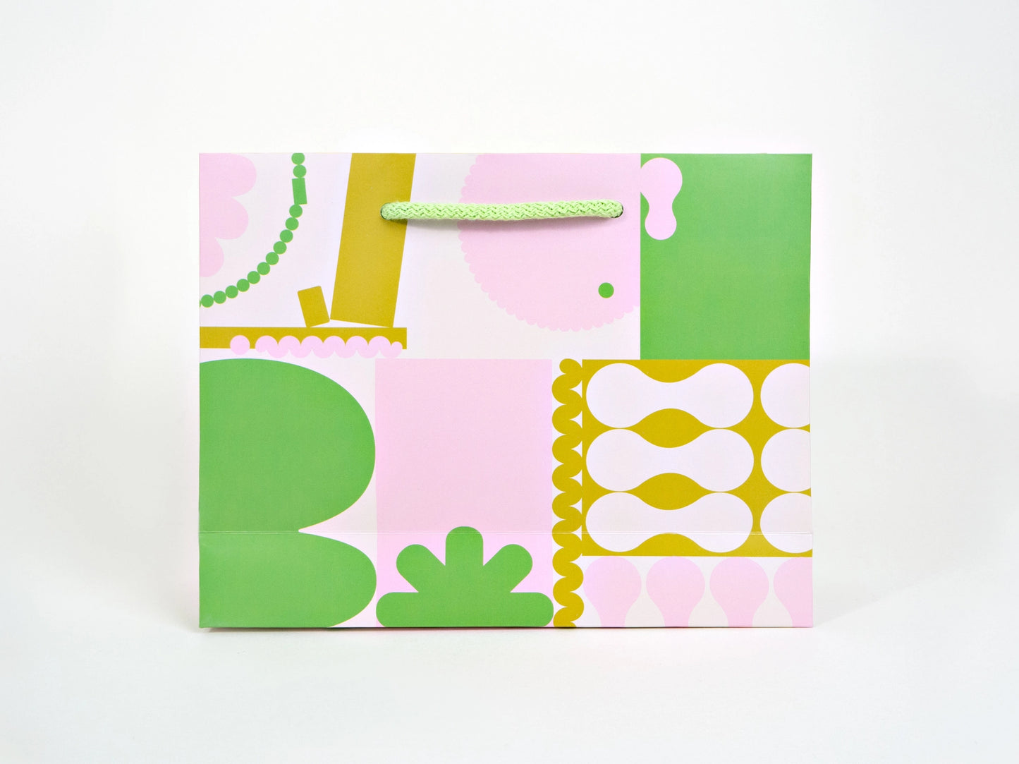 Colorful patterned gift bag on a white background