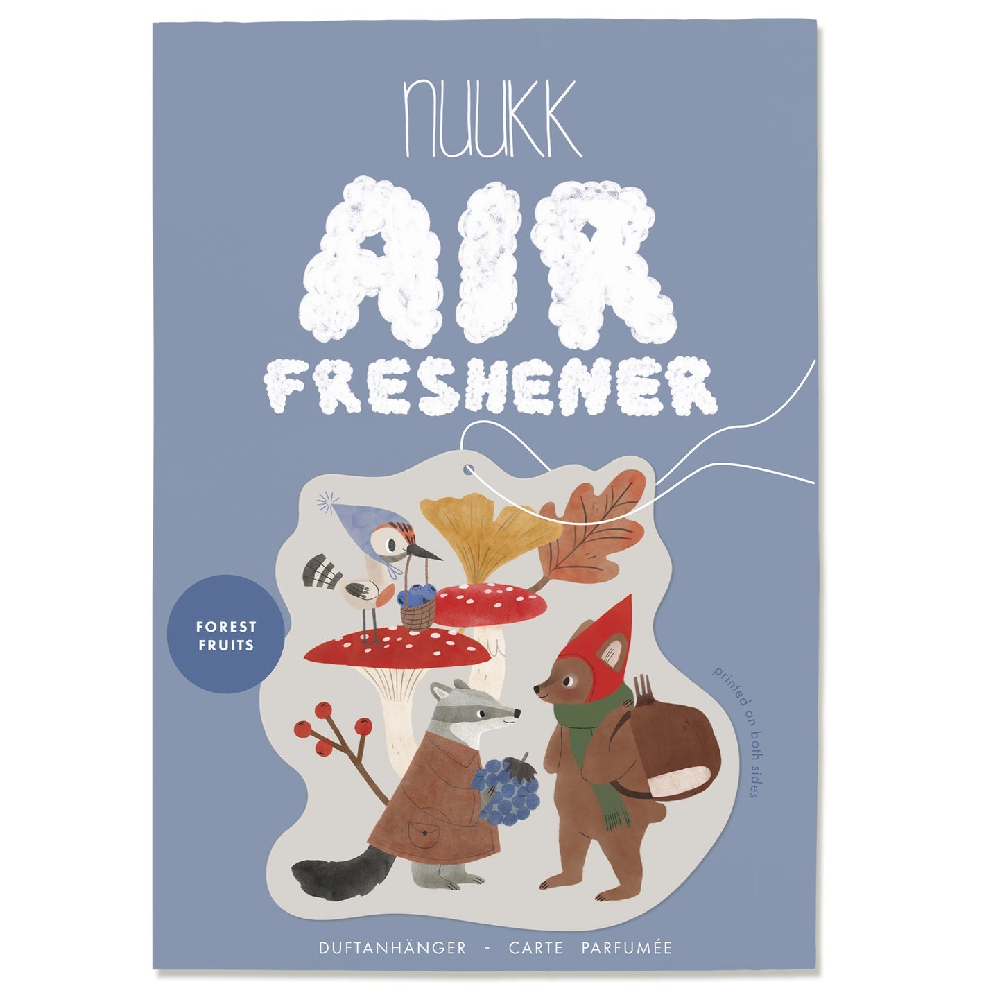 Nukk air freshener packaging with forest-themed illustration on a blue background