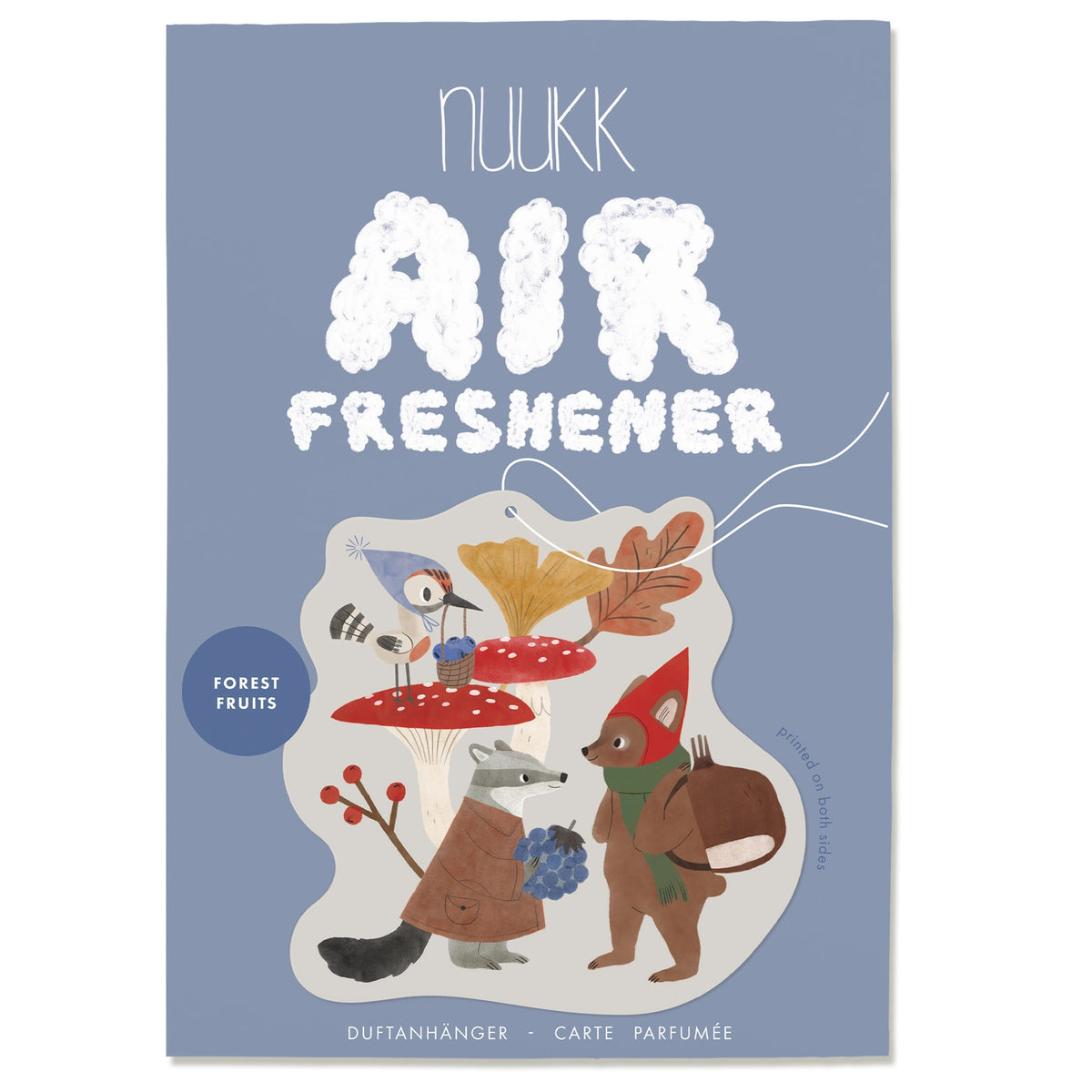 Nukk air freshener packaging with forest-themed illustration on a blue background