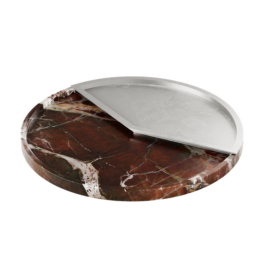 A moment captured in design. The 5 O’CLOCK tray pairs a high quality round marble base with a lacquered aluminum inlay, marking 5pm. A refined companion for drinks, small bites, or whatever your after-hours ritual may be. Looks stunning on a kitchen counter with groupings of fruit or food of any kind. It creates a distinctive frame that looks elegant and truly styled. Red Marble 