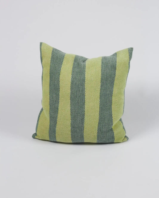 Green and gray striped pillow on a white background