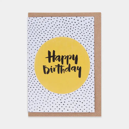 Birthday card with yellow circle and 'Happy Birthday' text on a polka dot background
